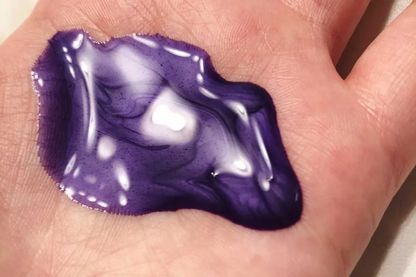 showing the Best Cruelty-Free Purple Shampoo on hand