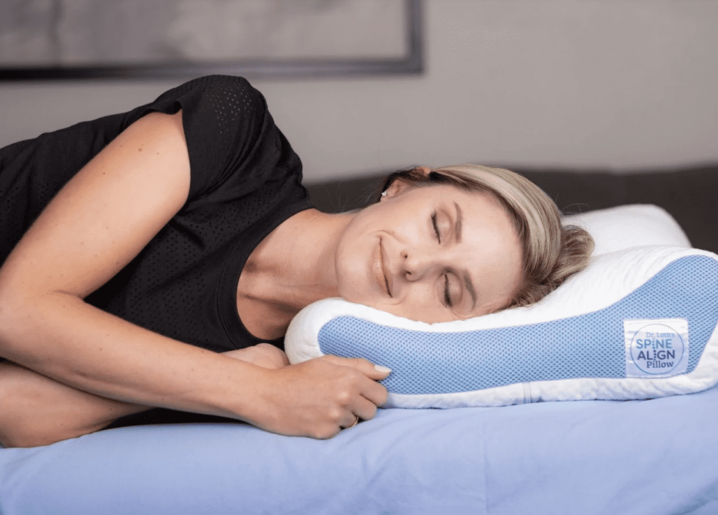 woman sleeping on luxury pillow after reading Cake Style recommendations in SpineAlign review